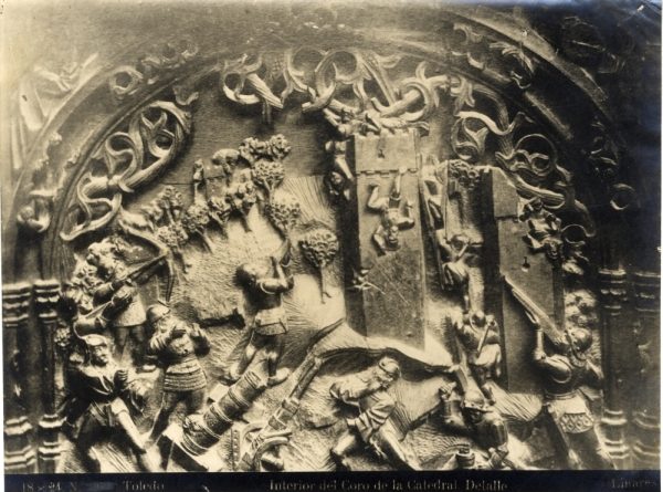 271 - Sillería baja del Coro - Escena del asalto y bombardeo de un castillo durante la Guerra de Granada